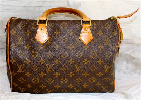 borsa louis vuitton con lucchetto|louis vuitton shoulder bag.